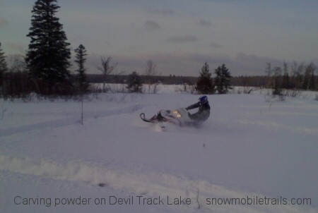 Devil Track Lake powder snowmobiling