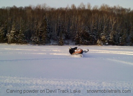 Devil Track Lake powder snowmobiling